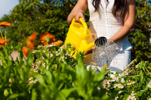 Worker performing a safety check on gardening equipment